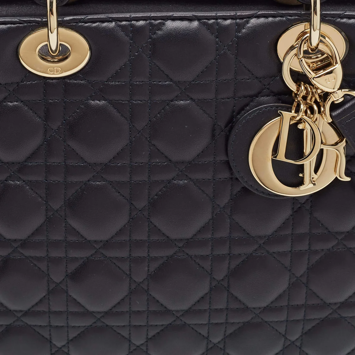 The Luxury Closet Pre-owned luxury handbags (Hermès Kelly, Chanel, Dior) side view - luxury handbag authentication proce