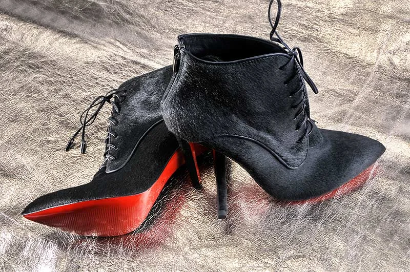 Christian Louboutin Red Sole Shoes front view - Christian Louboutin brand history
