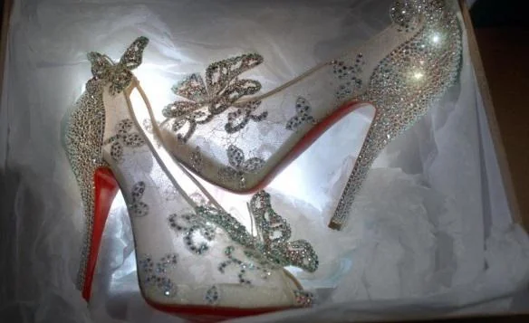 Christian Louboutin, Stuart Weitzman, Charlotte Olympia Designer heels front view