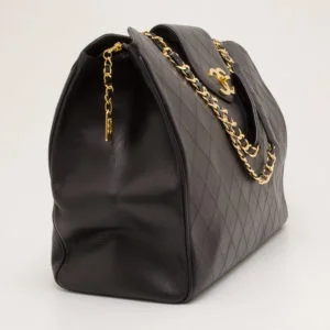 Chanel Chanel Vintage Black Quilted Jumbo Weekender Tote side view - vintage Chanel Jumbo Weekender tote