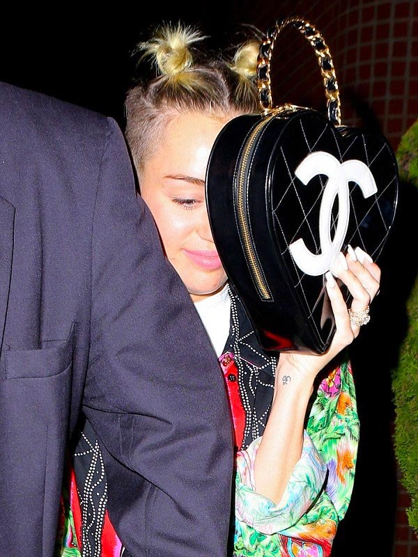 Miley Cyrus heart shape chanel bag